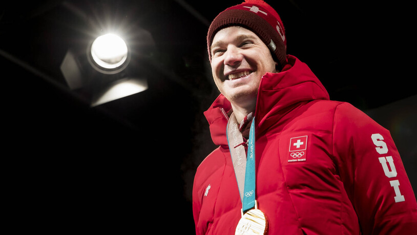 Olympiasieger Dario Cologna wird nach seiner Rückkehr von den Olympischen Spielen in Pyeongchang in Davos gefeiert.