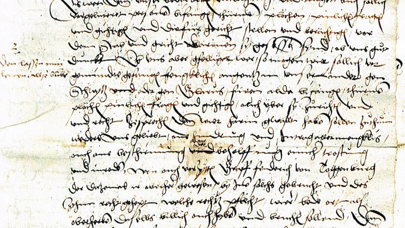 Feuertod: Das Relief von Otto Münch am Südportal des Grossmünsters Zürich, geschaffen 1938, erinnert an den Tod von Jakob Kaiser in Schwyz.