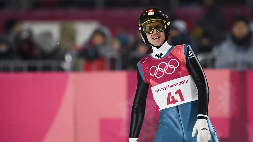 Simon Ammann lächelt nach erfolgreicher Qualifikation für das Springen von der Grossschanze