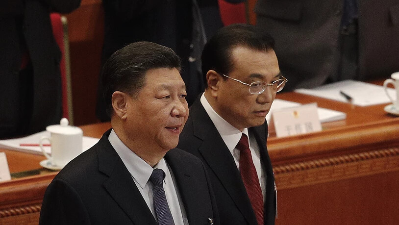 Der chinesische Präsident Xi Jinping (l) und Premierminister Li Keqiang am Volkskongress.