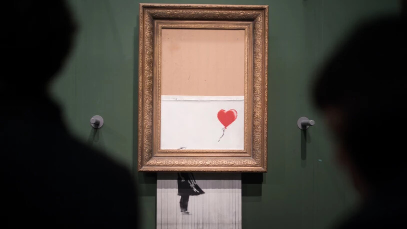 Banksy, der Marketingstratege: Indem der britische Street-Art-Künstler sein "Girl with Balloon" schredderte, schuf er mit "Love is in the Bin" ein neues Objekt der Begierde.