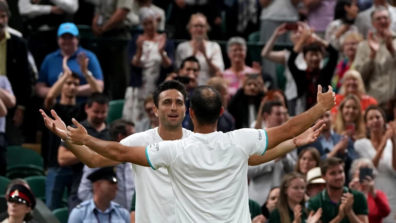 Die Erlösung nach einem epischen Final: Juan Sebastian Cabal (re.) und Robert Farah jubeln in Wimbledon über ihren ersten Grand-Slam-Titel