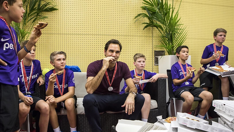 Der Pizza-Plausch mit den Ballkids wurde Federer am Heimturnier zu einer Tradition
