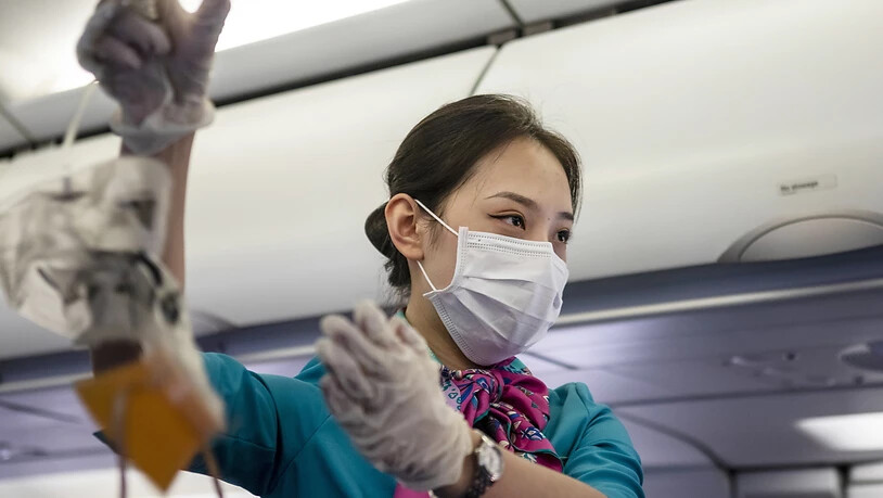 Sicherheit auch im Flugzeug: Das Coronavirus belastet die Airline-Branche (Symbolbild).