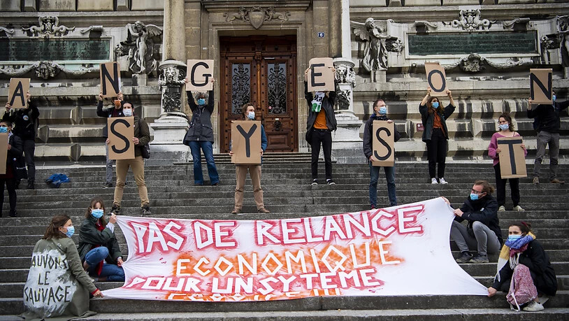 Klima-Aktivisten plädieren in Lausanne für den Neustart mit einem neuen System.