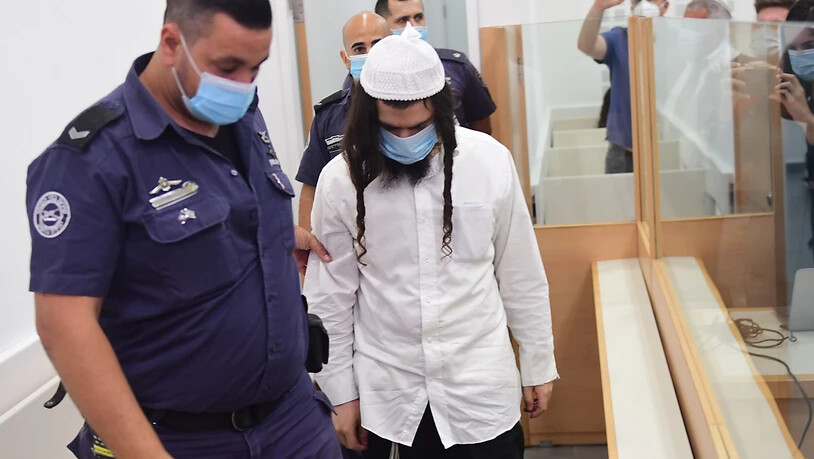 Amiram Ben-Uliel, israelischer Rechtsaktivist, kommt zur Urteilsverkündung in ein Bezirksgericht in Lod. Fünf Jahre nach einem tödlichen Brandanschlag auf eine Palästinenserfamilie hat ein israelisches Gericht den Hauptverdächtigen schuldig gesprochen…