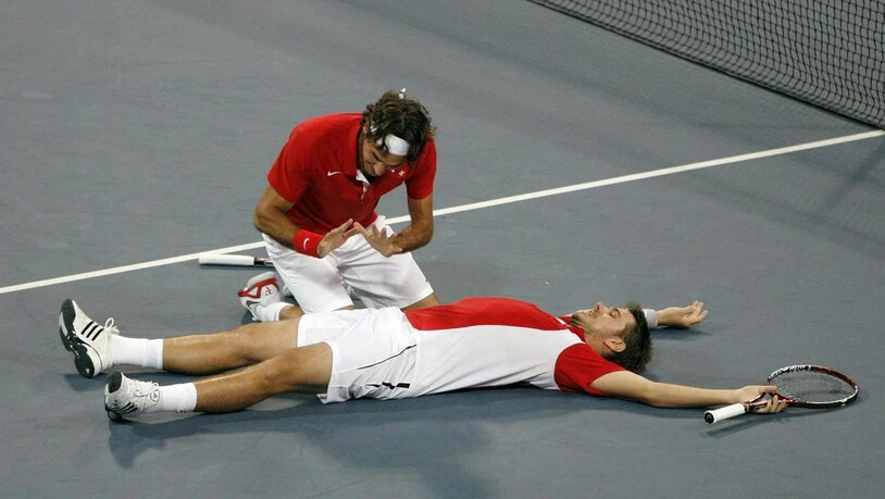 Unvergessen: Roger Federer wärmt sich am "brennenden" Wawrinka