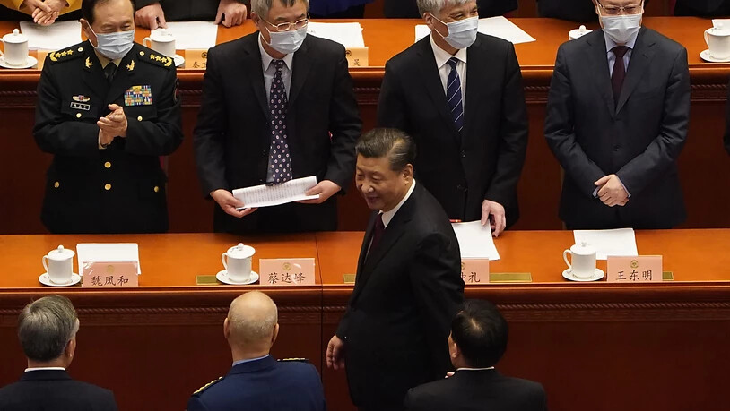 Der Präsident von China und Generalsekretär der Kommunistischen Partei, Xi Jinping, bei der Abschlusssitzung der Politischen Konsultativkonferenz des chinesischen Volkes. Foto: Mark Schiefelbein/AP/dpa