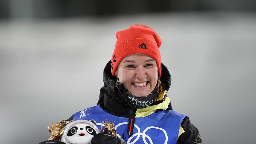 Denise Herrmann strahlt: Gold - auch dank Schweizer Mithilfe.
