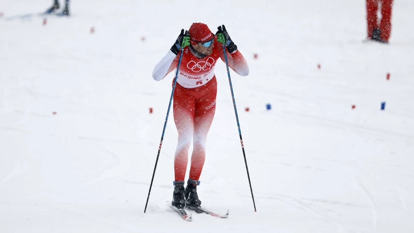 Letzter Auftritt mit der Staffel: Dario Cologna läuft mit seinen Teamkollegen bei garstigen Bedingungen an den Olympischen Spielen auf Rang 7.