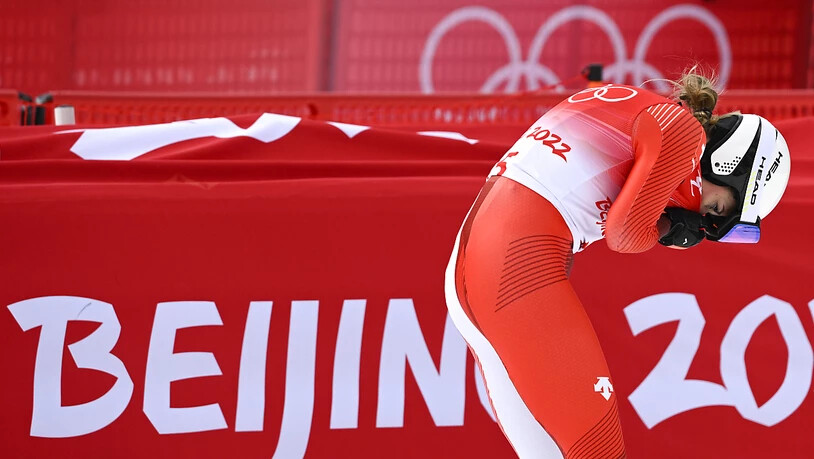 Corinne Suter sieht im Ziel grün für die Führung aufleuchten und kann es zunächst kaum glauben