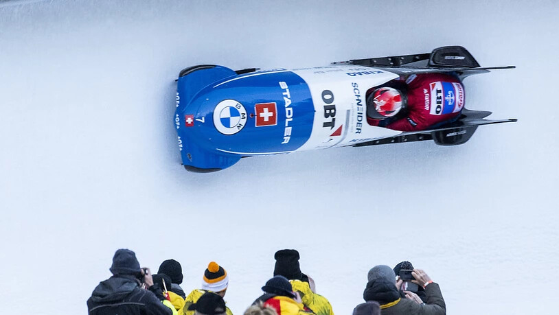 Fahren der Bronzemedaille entgegen: Pilot Michael Vogt und Anschieber Sandro Michel.