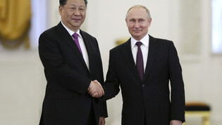 ARCHIV - Xi Jinping (l), Präsident von China, trifft Wladimir Putin, Präsident von Russland, während eines Besuchs im Kreml im Juni 2019. Foto: Evgenia Novozhenina/POOL REUTERS/AP/dpa