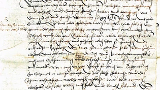 Feuertod: Das Relief von Otto Münch am Südportal des Grossmünsters Zürich, geschaffen 1938, erinnert an den Tod von Jakob Kaiser in Schwyz.