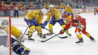 Wo ist die Scheibe? Die Davoser Claude-Curdin Paschoud und Magnus Nygren verteidigen gegen Biels Gaetan Haas.